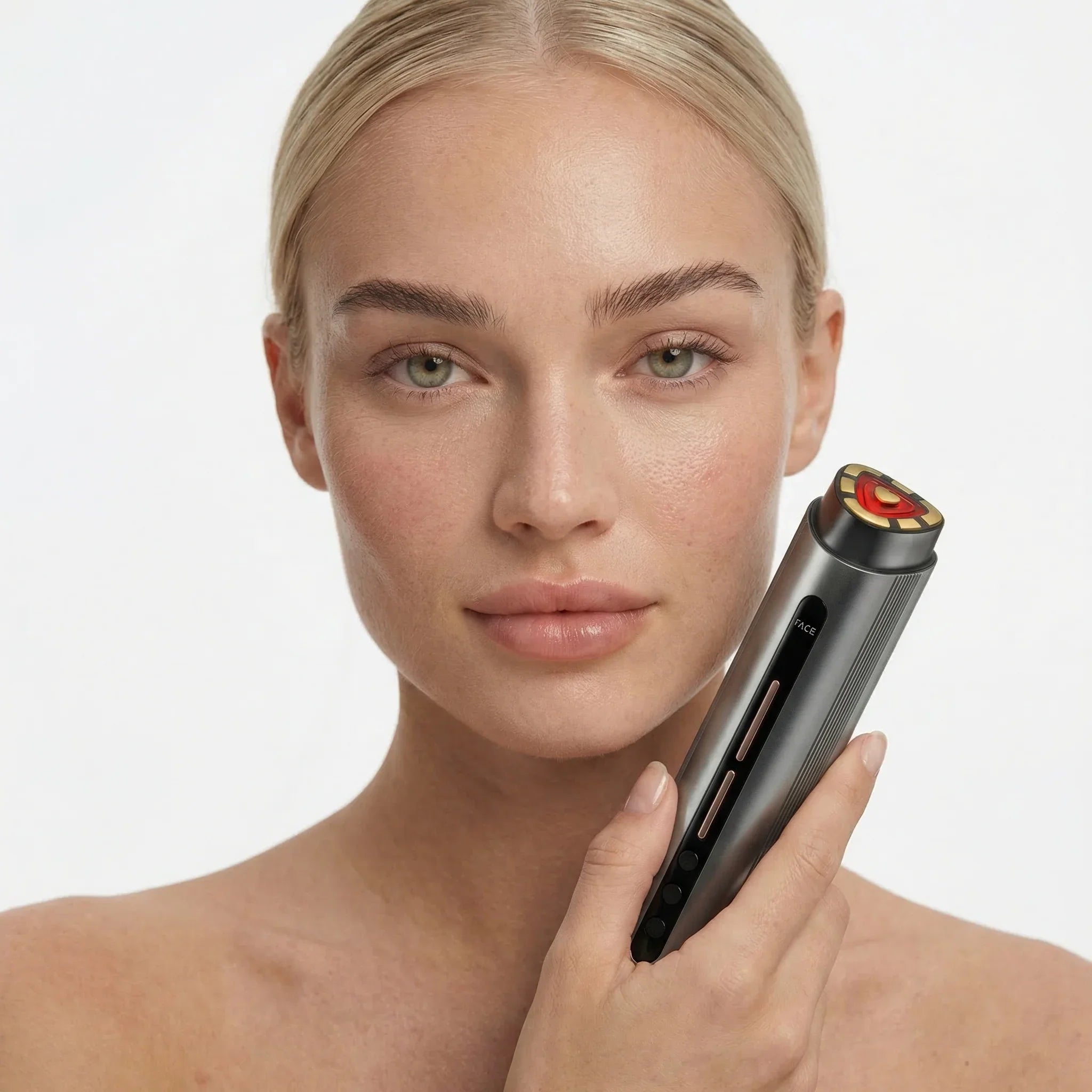 Woman holding the NEO LUMINUS Anti-Aging Facial Device against her face