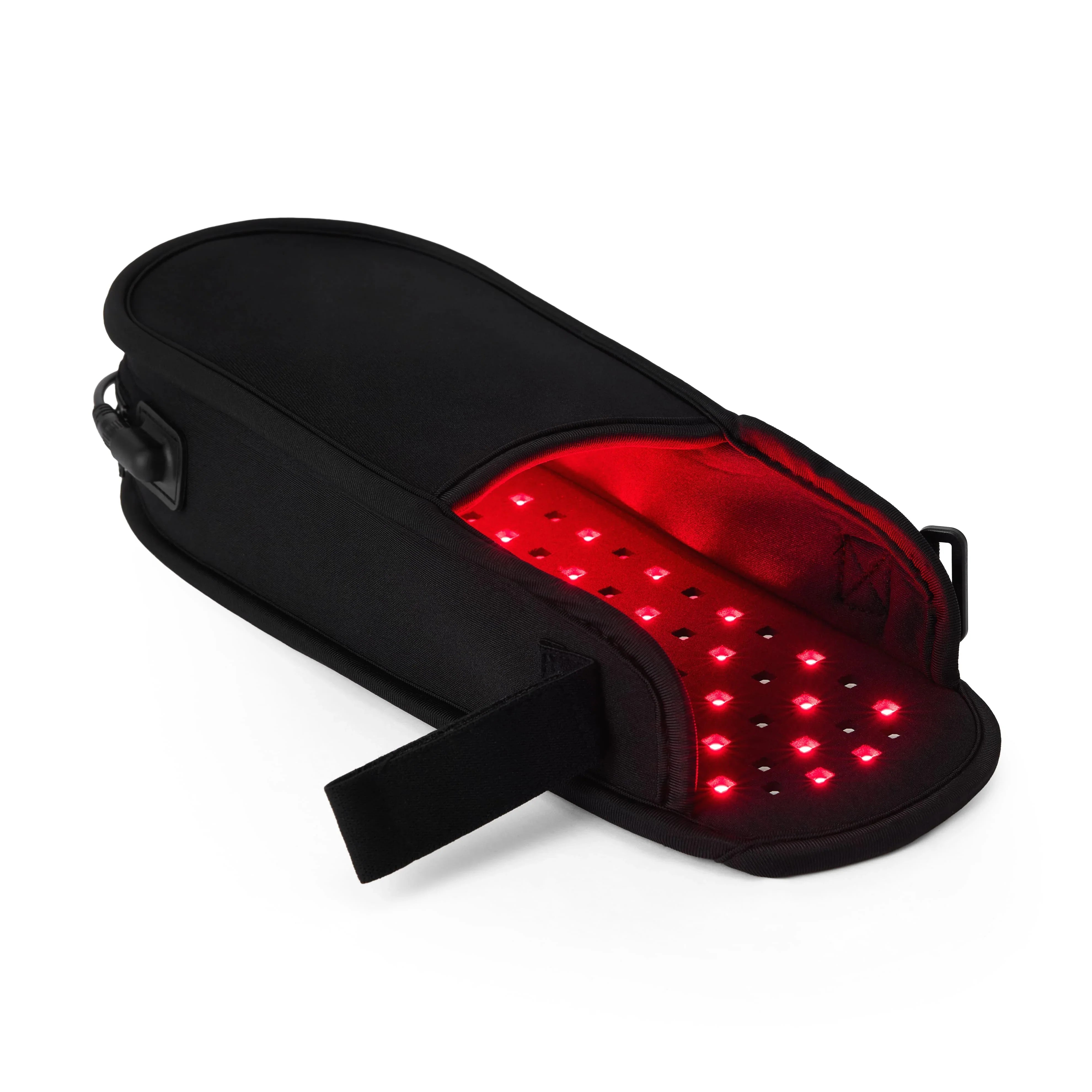 NEO LUMINUS Red Light Therapy Slipper glowing red on a foot